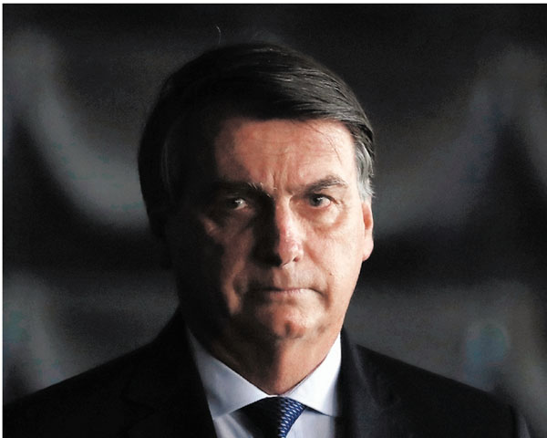 Brazilian aborigines report to the International Court of justice against President for genocide