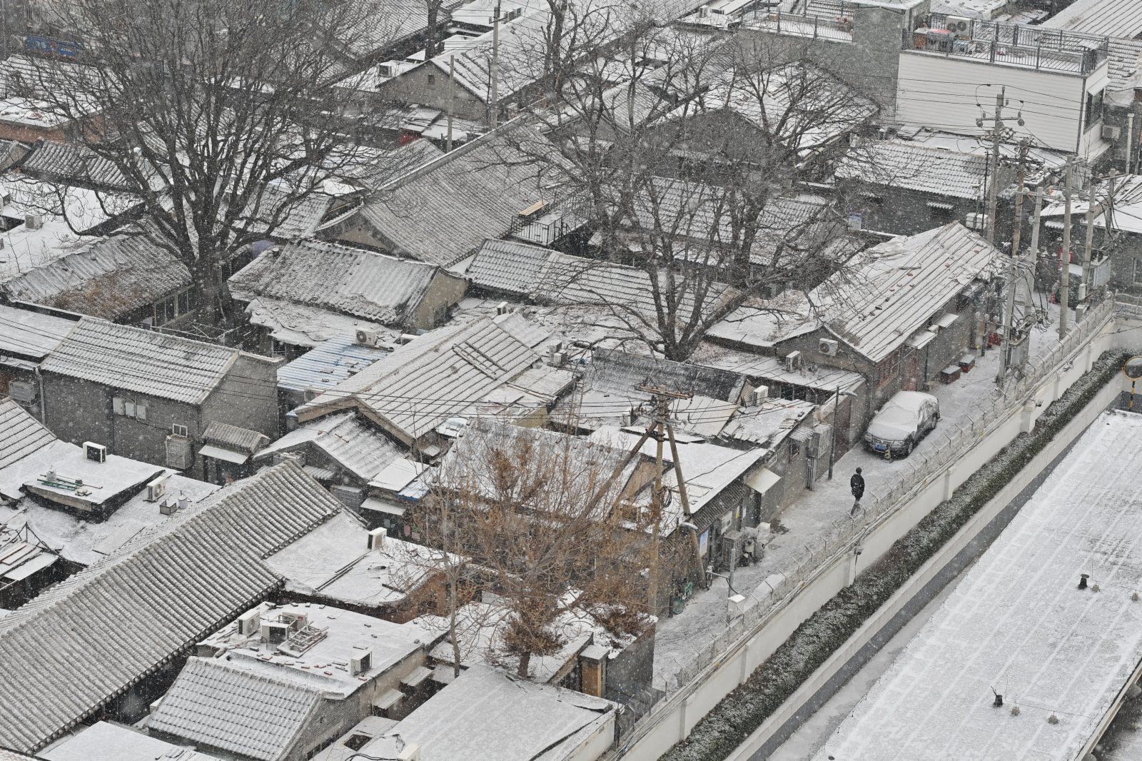 這是1月20日在北京宣武門附近拍攝的雪景。（新華社）