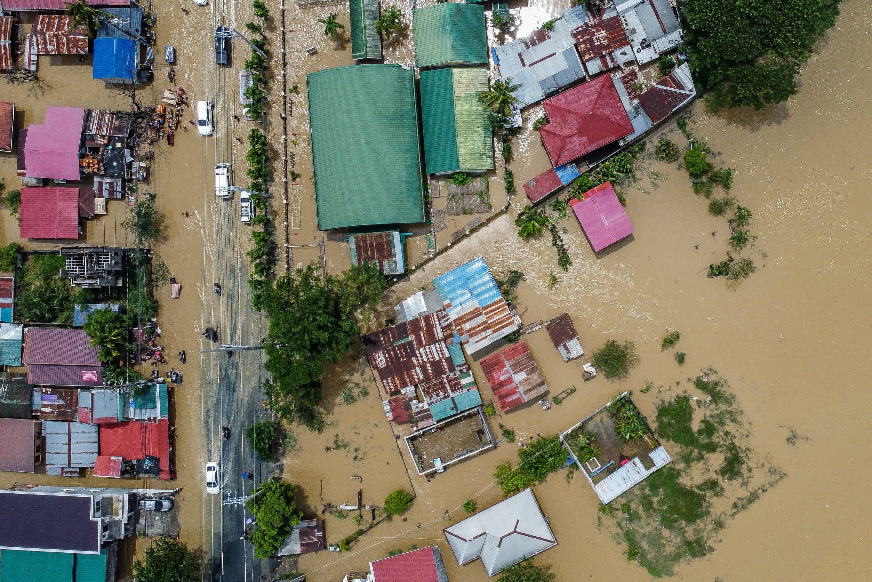 這是9月26日在菲律賓布拉干省航拍的遭洪水侵襲的區域。（新華社）