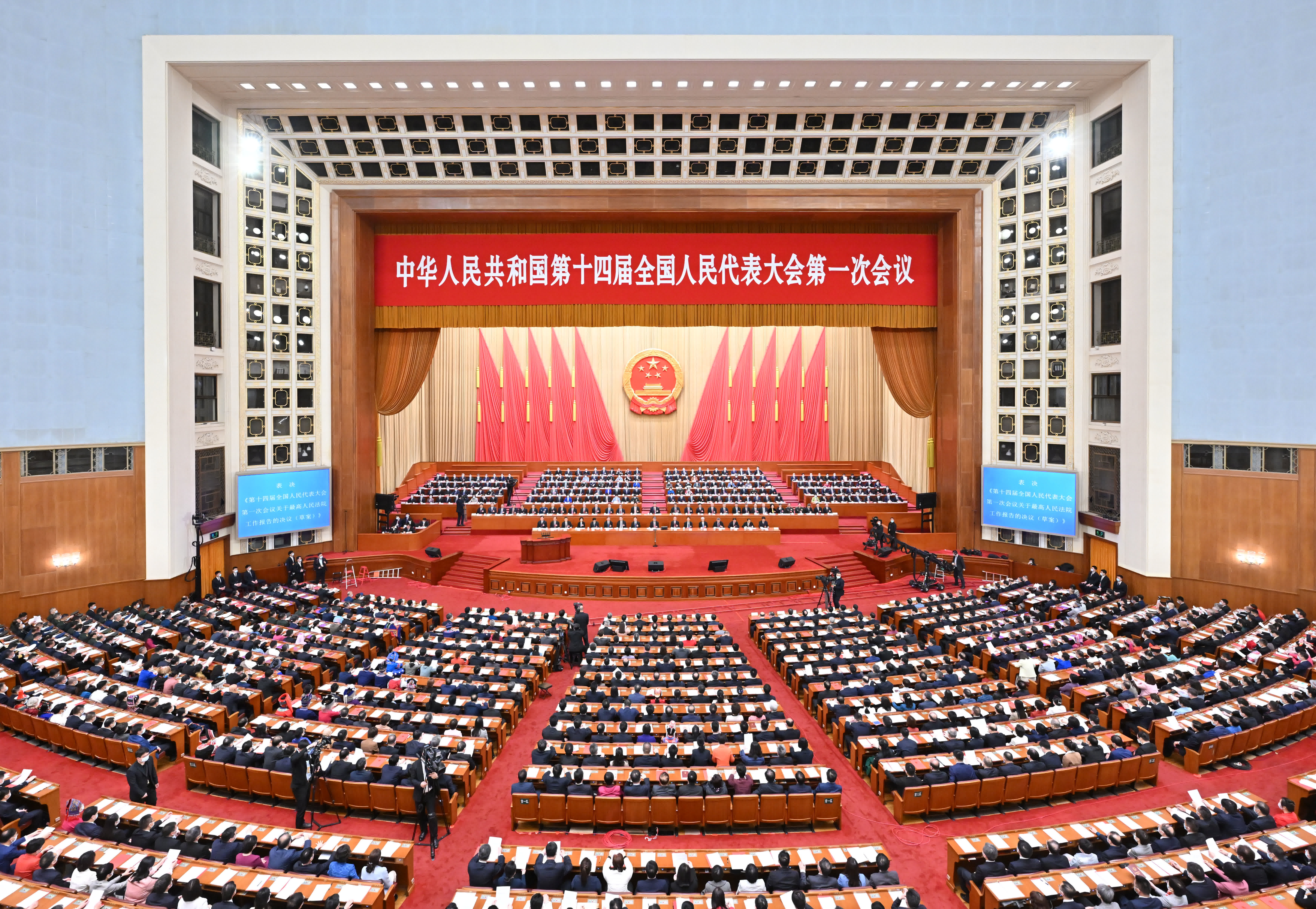 3月13日，第十四屆全國人民代表大會第一次會議在北京人民大會堂舉行閉幕會。（新華社）