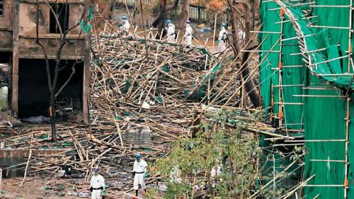 大埔宏福苑大火 | 為保遺體完整　DVIU隊員忍淚徒手挖泥濘污水