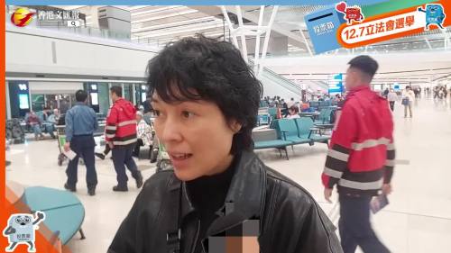 （有片）立法會選舉 |機(jī)場投票站丁女士：專門從上海飛回香港投票