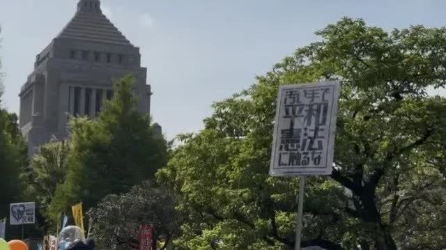 日本通過內閣決議正式允許出口殺傷性武器　此前數萬名民眾集會抗議