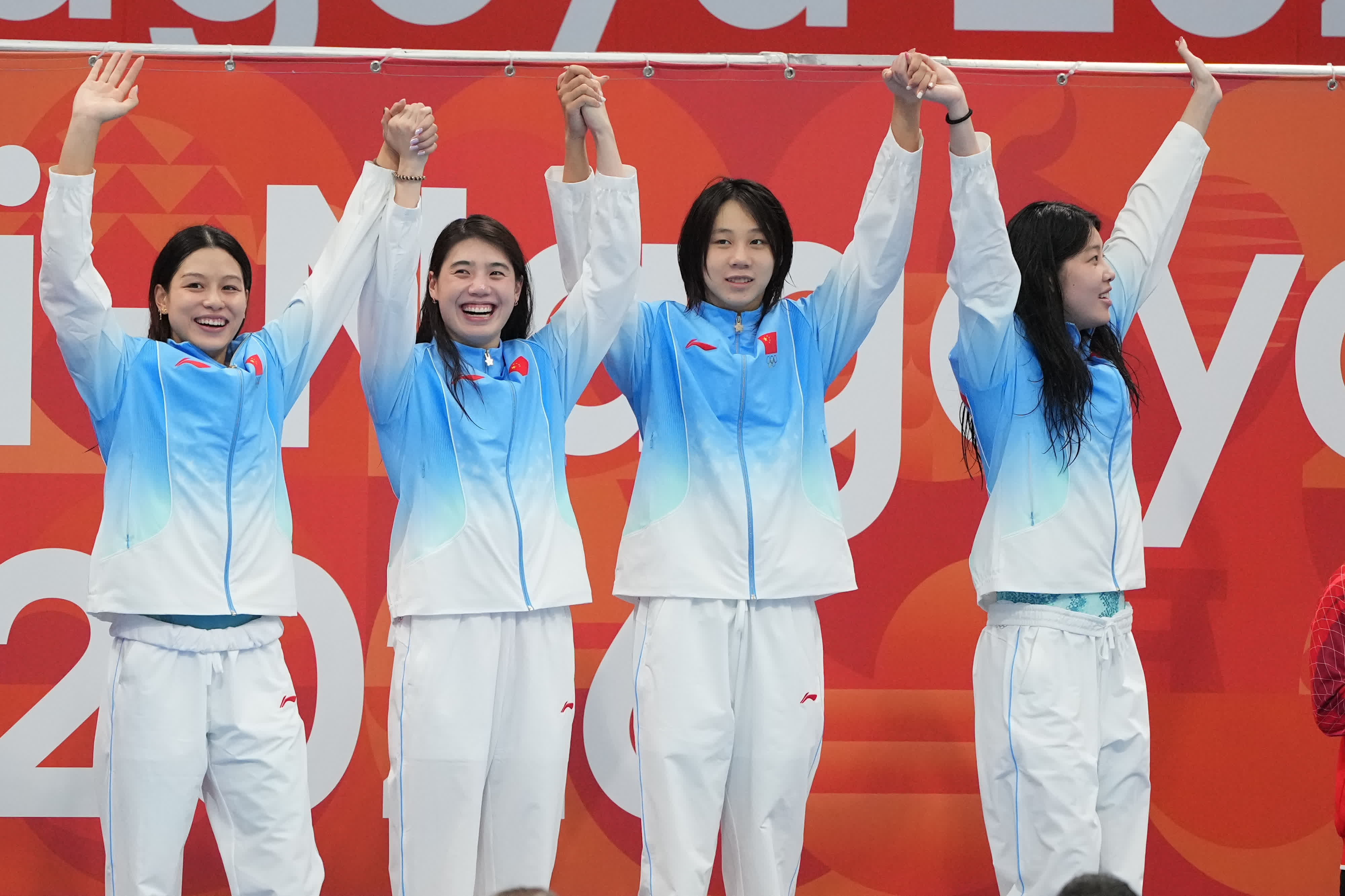 9月20日，名古屋亞運會女子4×100米自由泳接力決賽，由余依婷、張雨霏、程玉潔、吳卿風組成的中國隊奪得金牌，蟬聯冠軍並打破賽會紀錄。（大公文匯全媒體記者麥鈞傑 攝）